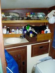 The Head, our little sweat box where all the great ideas come from. We can also pump fresh water into the sink. 