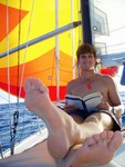JR expanding his knowledge on poor American policy with Howard Zinn. One of the few calmer days that we were able to fly the spinnaker without getting too sloshed around.