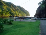 The town's main square, the basketball court. Dancyn is the boat farthest to the left in background.