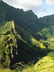 Hiking breathlessly around the island. The Marquesas were at one time populated by many different villages cut off from one another by the steep cliffs, yet they still managed to navigate around them to fight one another and the feasting on one's enemies in order to absorb each other's spirit. One of the most isolated island groupd, they were one of the last islands to give up cannibilism.