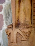 Strange mix of old and new symbols. The tiki faces are everywhere throughout the churchs and art. Aliens, anyone?
