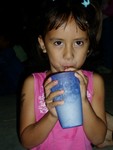 Girl at dance. The dance was a huge town event and afterwards everyone danced to sausy beats.