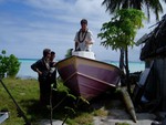 Taverio's skiff. Once we started bringing them gifts of fish we were like their long lost grandchildren. As he has gotten older he is less able to fish the ciguatera-free parts of the reef which are many miles away. They relyed mostly on frozen chicken and tinned beef, a shame since the fish are so plentiful.