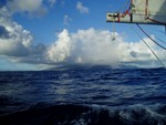 Molokai island. After 19 days, we spotted our first speck of land, the Big Island of Hawaii. At this point, we are less than 12 hours from Oahu. The winds were unusually light so we were able to go windward of the chain.