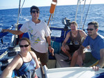 Despite thousands of miles of blue water, we still wanted to go sailing. We took our work buddies out, Dawn, Rich and Andy, and knocked all the books off the shelves. First taste of daysailing Hawaiian waters--not easy!