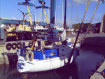Yard work, the necessary evil of boat ownership!! We hauled the boat in Keehi Lagoon and worked nonstop for 72 hours washing, grinding, painting and buffing.