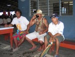 Drinking kava in the public market.